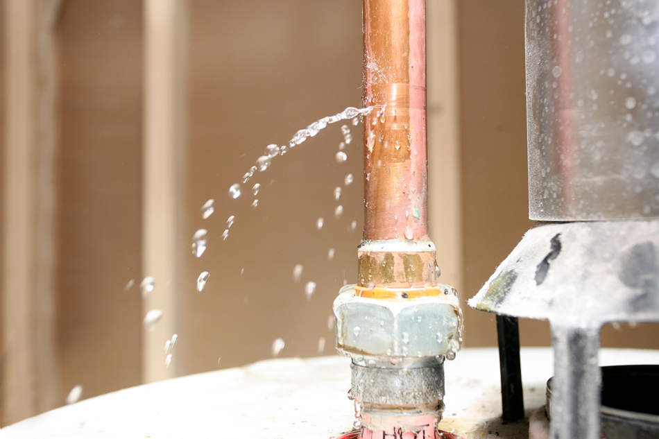 Pipe-with-Leak-157376761 Copper pipe with a leak
